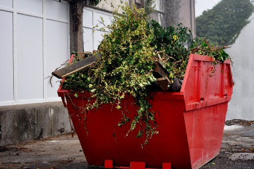 Homeowner composting garden waste
